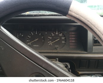 A Long Parked Old Car Dashboard
