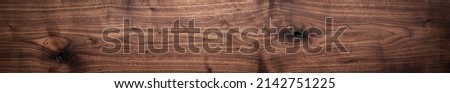 Long plank texture background. Panoramic wood plank texture background. Walnut wood plank natural texture. Panoramic background elements.