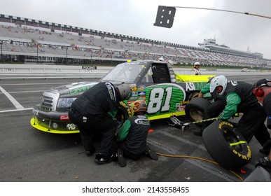 Long Pond, PA, USA - August 7, 2011: Race Driver David Starr Makes A Pit Stop During A NASCAR Camping World Truck Series Event At Pocono Raceway In Pennsylvania.