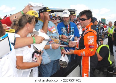 Long Pond, PA, USA - August 1, 2008: Race Driver Tony Stewart Signs Autographs During A NASCAR Cup Series Event At Pocono Raceway In Pennsylvania.