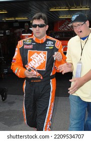 Long Pond, PA, USA - August 1, 2008: Race Driver Tony Stewart Signs Autographs During A NASCAR Cup Series Event At Pocono Raceway In Pennsylvania.