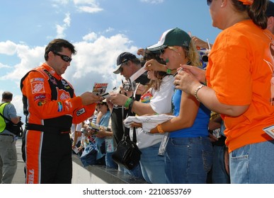 Long Pond, PA, USA - August 1, 2008: Race Driver Tony Stewart Signs Autographs During A NASCAR Cup Series Event At Pocono Raceway In Pennsylvania.