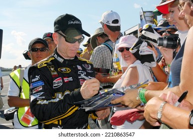 Long Pond, PA, USA - August 1, 2008: Race Driver Mark Martin Signs Autographs During A NASCAR Cup Series Event At Pocono Raceway In Pennsylvania.