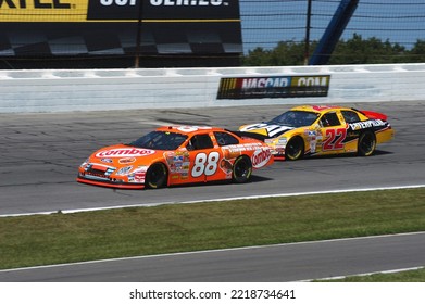 Long Pond, PA, USA - August 5, 2007: Ricky Rudd (88) Leads Dave Blaney During A NASCAR Cup Series Event At Pocono Raceway In Pennsylvania. Cars Slightly Blurred To Depict Speed.