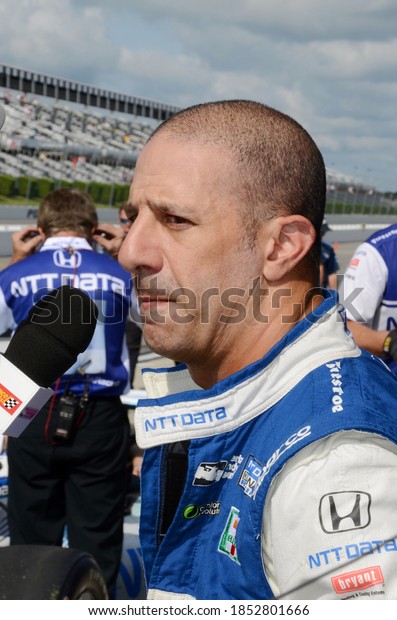 Long Pond, PA / USA - August 19,\
2017:  Indy 500 winner Tony Kanaan is interviewed after qualifying\
for the 2017 ABC Supply 500 at Pocono Raceway in\
Pennsylvania.