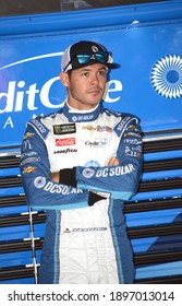 Long Pond, PA, USA - July 28, 2018:  NASCAR driver Kyle Larson waits to practice for the 2018 NASCAR Gander Outdoors 400 at Pocono Raceway in Pennsylvania.