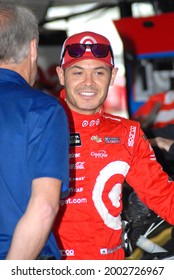 Long Pond, PA, USA - July 29, 2017:  NASCAR driver Kyle Larson gets interviewed by driver-turned journalist Kenny Wallace after practice for the 2017 Overton's 400 at Pocono Raceway in Pennsylvania.
