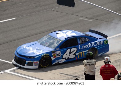 Long Pond, PA, USA - July 28, 2019:  NASCAR driver Kyle Larson exits his pit after making a pit stop during the 2019 NASCAR Gander RV 400 at Pocono Raceway in Pennsylvania.