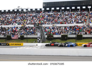 Long Pond, PA, USA - June 7, 2015:  NASCAR Drivers Take The Green Flag During The 2015 NASCAR Axalta We Paint Winners 400 At Pocono Raceway In Pennsylvania.