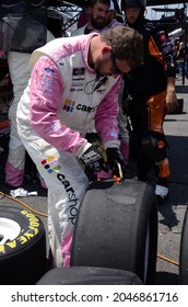 Long Pond, PA, USA - June 27, 2021:  A NASCAR  Crewman Works On A Tire During The 2021 Pocono Green 225 Recycled By JP Mascaro And Sons NASCAR Xfinity Series Race At Pocono Raceway.