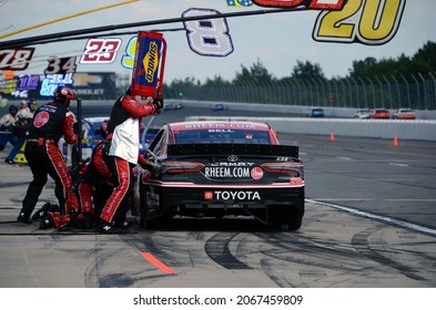 Long Pond, PA, USA - June 27, 2021:  NASCAR Driver Christopher Bell Makes A Pit Stop During The 2021 Explore The Pocono Mountains 350 NASCAR Cup Series Race At Pocono Raceway.