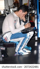 Long Pond, PA, USA - June 2, 2018:  NASCAR driver Kyle Larson analyzes data during practice for the Pocono 400 Cup Series race at Pocono Raceway.