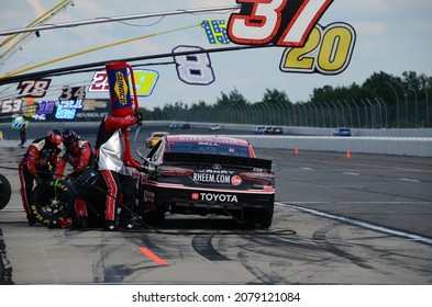 Long Pond, PA, USA - June 27, 2021:  NASCAR Driver Christopher Bell Makes A Pit Stop During The 2021 Explore The Pocono Mountains 350 NASCAR Cup Series Race At Pocono Raceway.