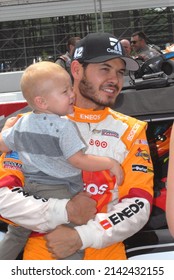 Long Pond, PA, USA - June 4, 2016: Race driver Kyle Larson and his son await the start of a NASCAR Xfinity race at Pocono Raceway in Pennsylvania.