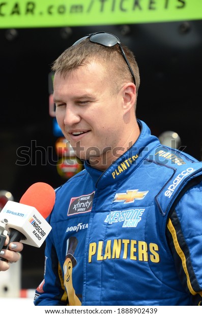 Long Pond, PA, USA - June\
1, 2019:  NASCAR driver Ryan Preece gets interviewed after\
qualifying for the 2019 NASCAR Pocono 400 at Pocono Raceway in\
Pennsylvania.