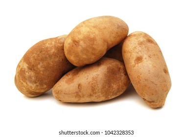 A Long Russet Potato On White Background