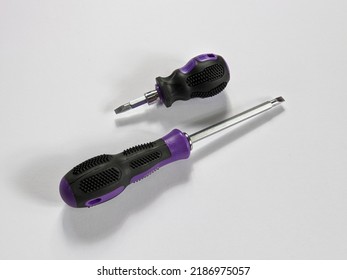 Long and short philips screw driver on isolated background