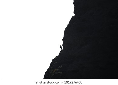 Long shot of climbers hanging by a cliff against white, high contrast