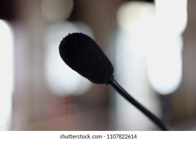 Long Skinny Microphone With Soft Blurred Out Background