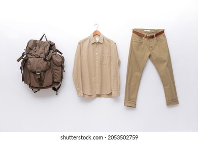 Long Sleeve Mens Shirt With Khaki Pants  With Backpack On Hanging