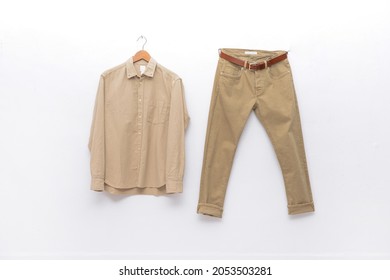 Long Sleeve Mens Shirt With Khaki Pants On Hanging