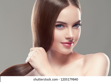 Long smooth hair healthy and beautiful woman with healthy skin cosmetic shampoo concept female model portrait - Shutterstock ID 1205179840