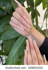 Long Square Acrylic Nails In Nude Color With White Lines Nail Art Design