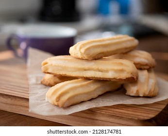 Long sticks shortbread with nice ridges, selective focus. Buttery biscuits Viennese fingers. Perfect companion to a cup of tea or coffee