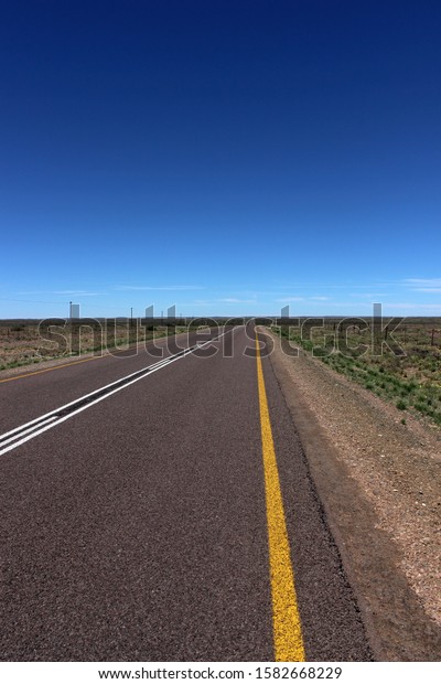 Long straight country road, R27 in the Northern\
Cape province of South\
Africa