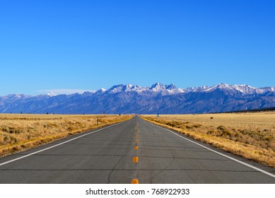 A Long Straight Road Leading Towards Great Sand Dunes National Park, Colorado, USA