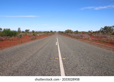 Long Straight Road In The Pilbara Region Of Western Australia.