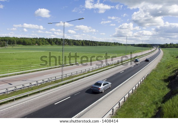 long stretch of highway\
in countryside