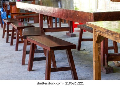 Long Table And Wooden Benches In Traditional Chinese Restaurant