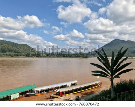 Long tail boat for river transportation, beautiful nature scene of Khong river