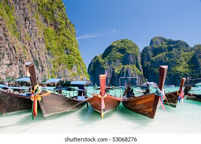 Long tail wooden boats at Maya Bay