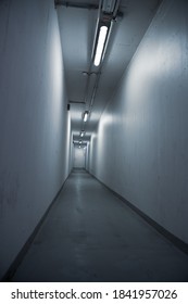 Long, Tight And Empty Hallway From A Low Angle Shot Making The Perspective Look Menacing