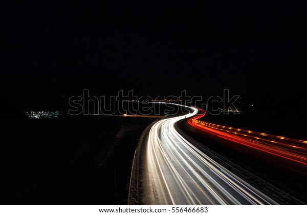Long Time Exposure of German Highway autobahn, red\
and white lights