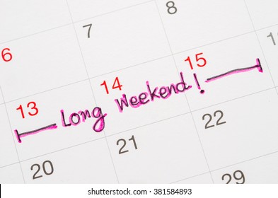 Long Weekend Handwriting On Page Calendar To Remind You An Important Appointment.