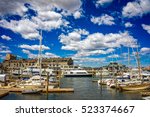 Long Wharf with Customhouse Block and sailboats, and yachts in Charles River in Boston, Massachusetts, the United States.