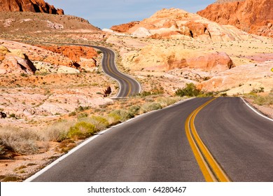 A Long And Winding Road Through Colorful Desert Sandstone