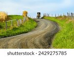 Long and Winding scenic rural road with Amish people in a horse drawn buggy. Sugarcreek and Millersburg Ohio OH. Created 10.10.2022        