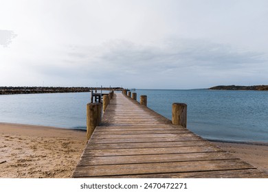 Long wooden pier on the sea. Beautiful landscape view.  - Powered by Shutterstock