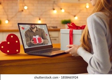 Long-distance Relationship And Virtual Date In Quarantine. Faceless Anonymous Couple In Love Video Calling Each Other During Lockdown And Showing Anniversary Gifts Or Valentine Presents They Prepared