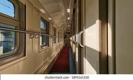 Long-distance train inside view. A compartment of a train carriage. Travel by rail