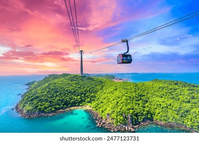 The longest cable car ride in the world, Phu Quoc island in South Vietnam, sunset sky. Below is traditional fishermen boats lined in the harbor of An Thoi town in the popular Hon Thom island. - Powered by Shutterstock