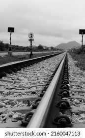 Long-established train tracks in black and white mode - Shutterstock ID 2160047113