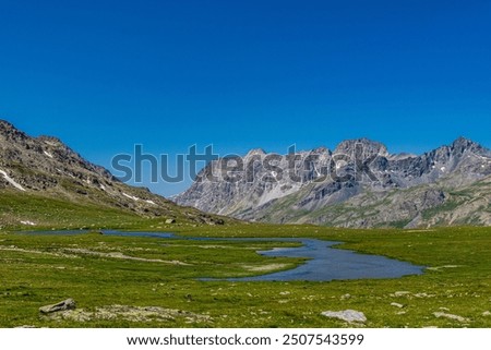 The Longet lakes, on the border between the Varaita Valley and the Ubaye Valley: jewels of nature at the foot of Monviso
