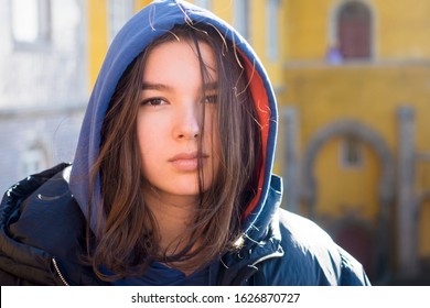 Long-haired Brunette Pensive Girl Teenager Face, Outdoors Portrait