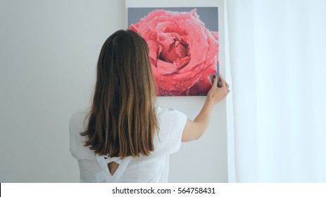 Long-haired Girl Hanging Painting