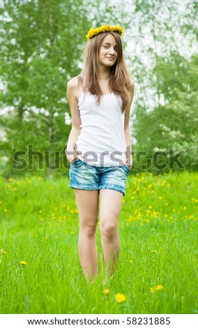 Similar – beautiful young woman smiling while walking in the park